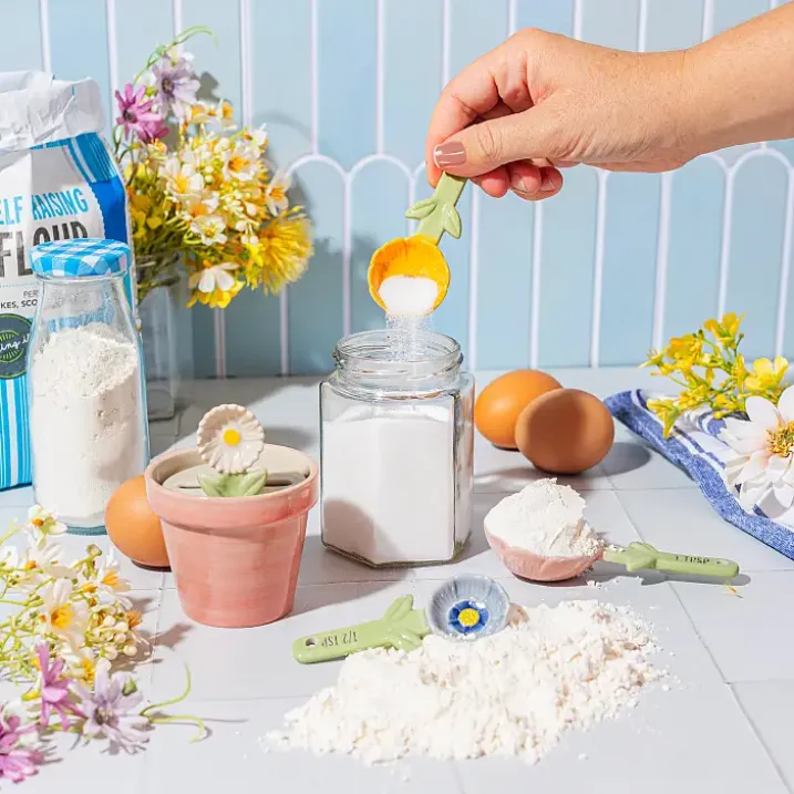 Cucharas medidoras en forma de flor con maceta
