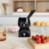 Fondue en forma de gato que cambia de expresión