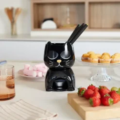 Fondue en forma de gato que cambia de expresión