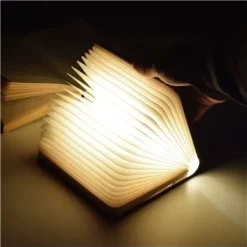 Lámpara libro que se ilumina al abrirse