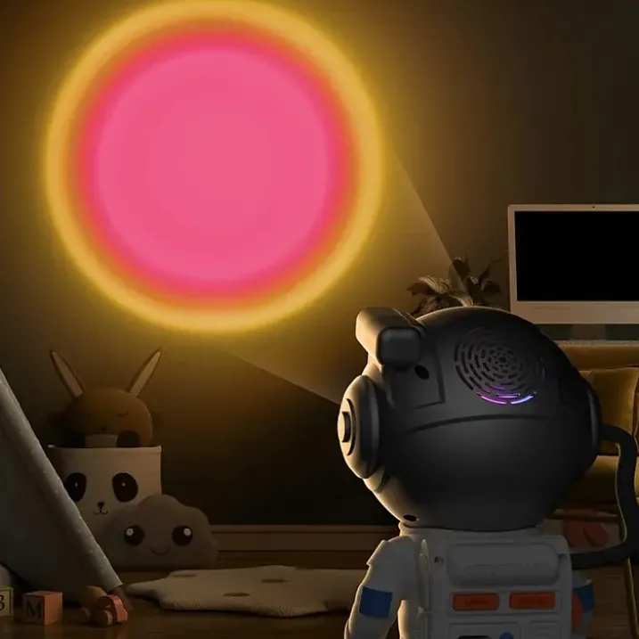 Mini proyector astronauta con sonidos relajantes
