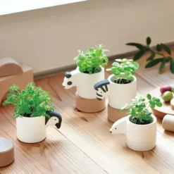 Monokuro mini maceta con kit de cultivo en forma de animalito
