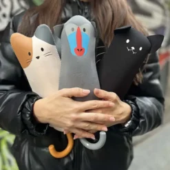 Paraguas plegable con funda en forma de animal