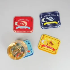 Posavasos originales en forma de lata de conservas