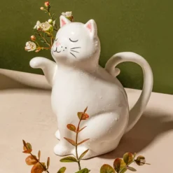 Regadera en forma de gato
