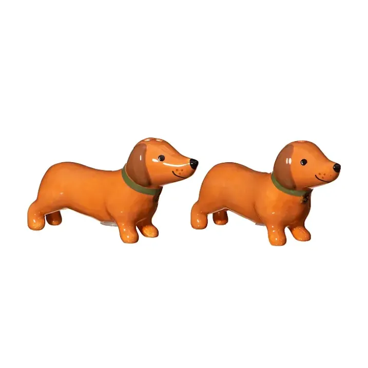 Salero y pimentero en forma de perritos salchicha