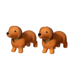 Salero y pimentero en forma de perritos salchicha