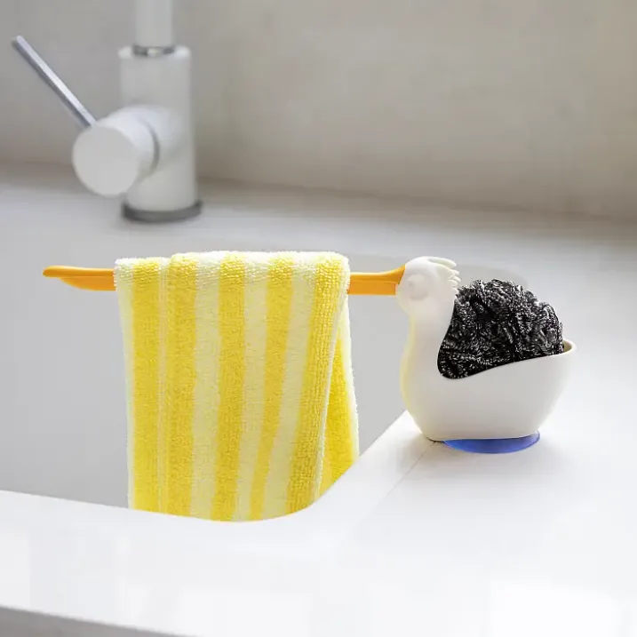 Soporte para estropajo y bayeta con forma de pelícano