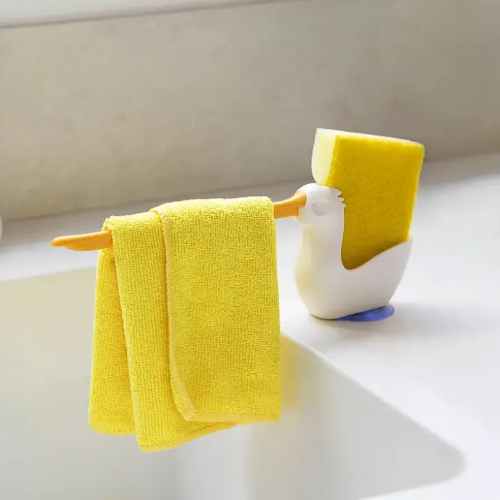 Soporte para estropajo y bayeta con forma de pelícano