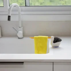 Soporte para estropajo y bayeta con forma de pelícano