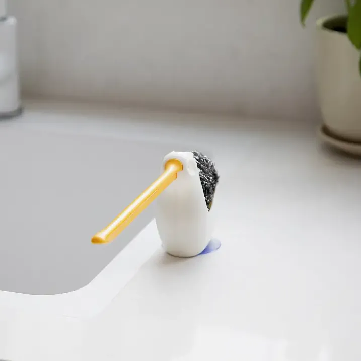 Soporte para estropajo y bayeta con forma de pelícano