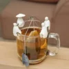 Soportes para bolsitas de té con forma de pescadores chinos