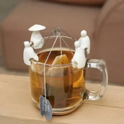 Soportes para bolsitas de té con forma de pescadores chinos