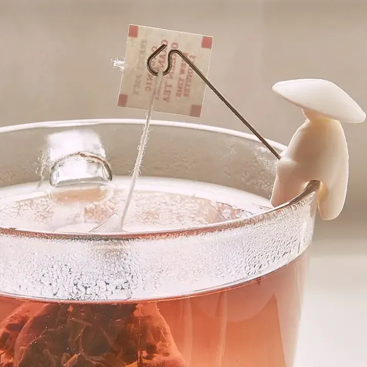 Soportes para bolsitas de té con forma de pescadores chinos