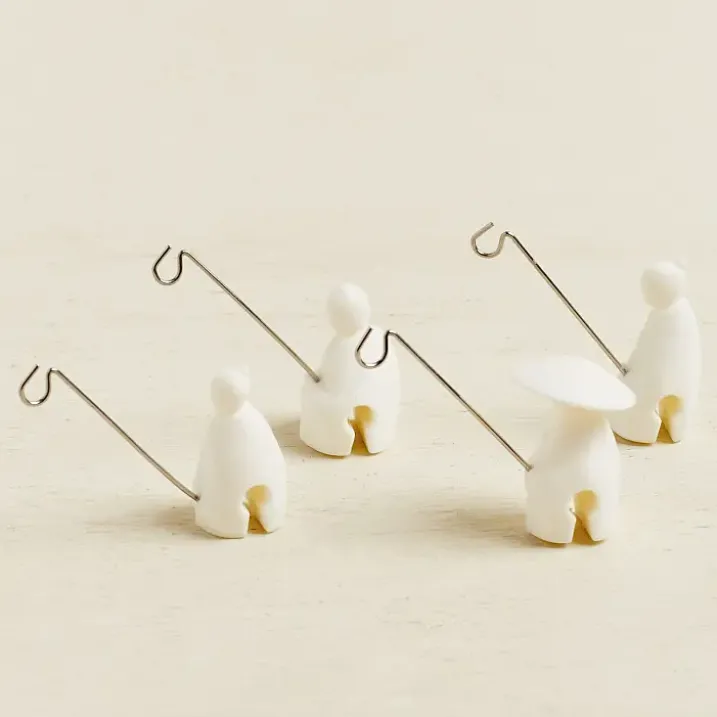 Soportes para bolsitas de té con forma de pescadores chinos