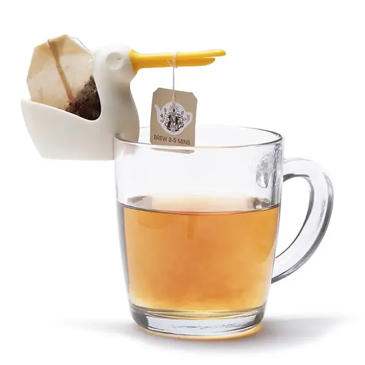 Soporte y colgador de bolsitas de té en forma de pelícano