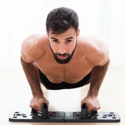 Tabla de flexiones push-up con bandas de resistencia