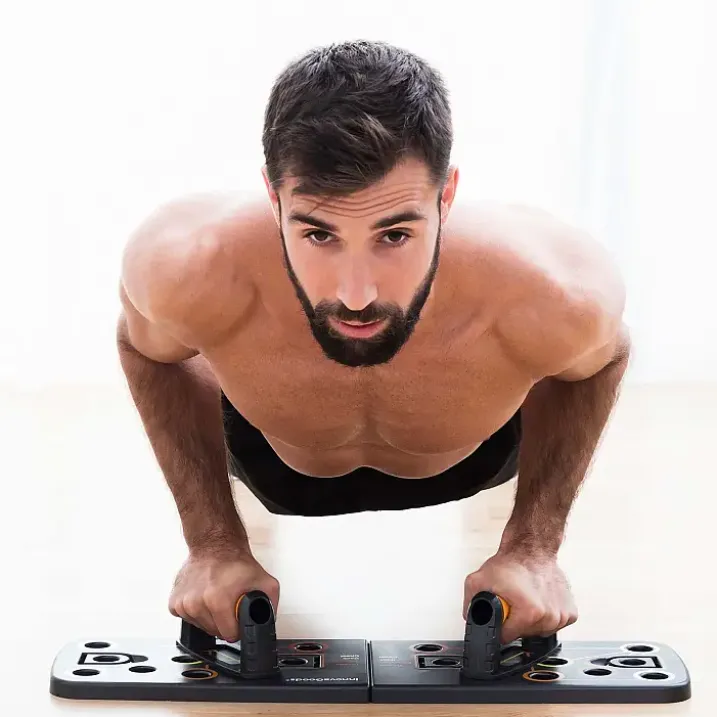 Tabla de flexiones push-up con bandas de resistencia