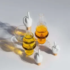 Tapón de botella en forma de manos