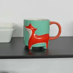 Taza con zorro en relieve