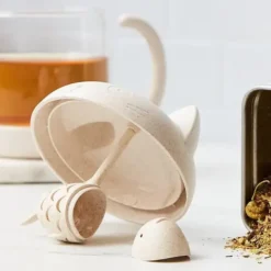 Taza de té en forma de gatito con pez infusor