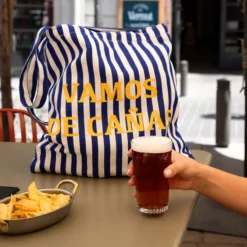Tote bag de rayas con mensaje Vamos de cañas