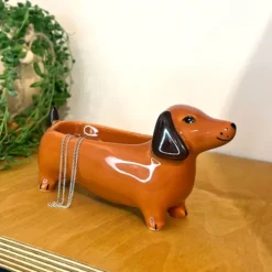 Vaciabolsillos en forma de perro salchicha