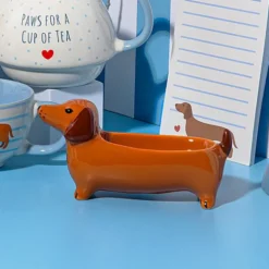 Vaciabolsillos en forma de perro salchicha